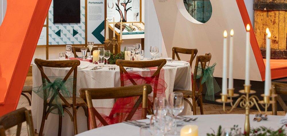 A gallery set for dinner